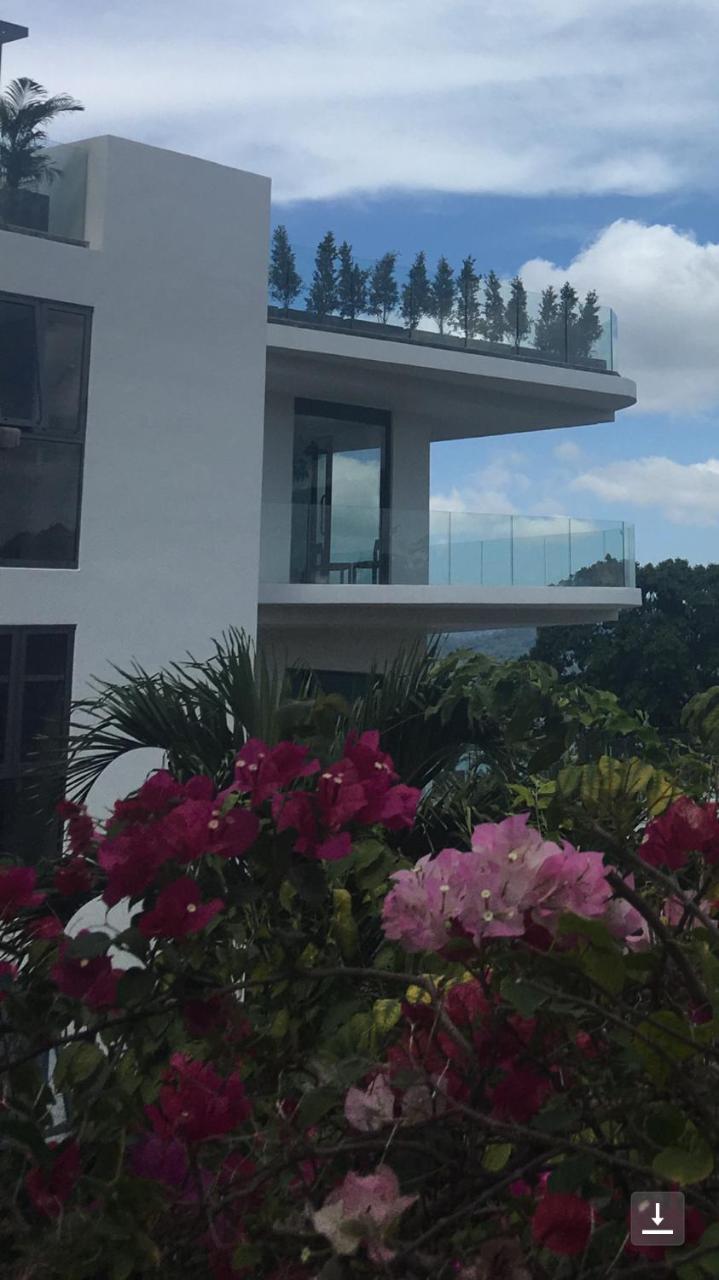 Hotel Patong Heights Extérieur photo A view of the house from the garden